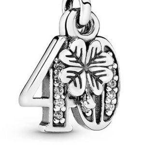 Pandora 40 Years of Love dangle charm with cubic zirconia, in sterling silver.